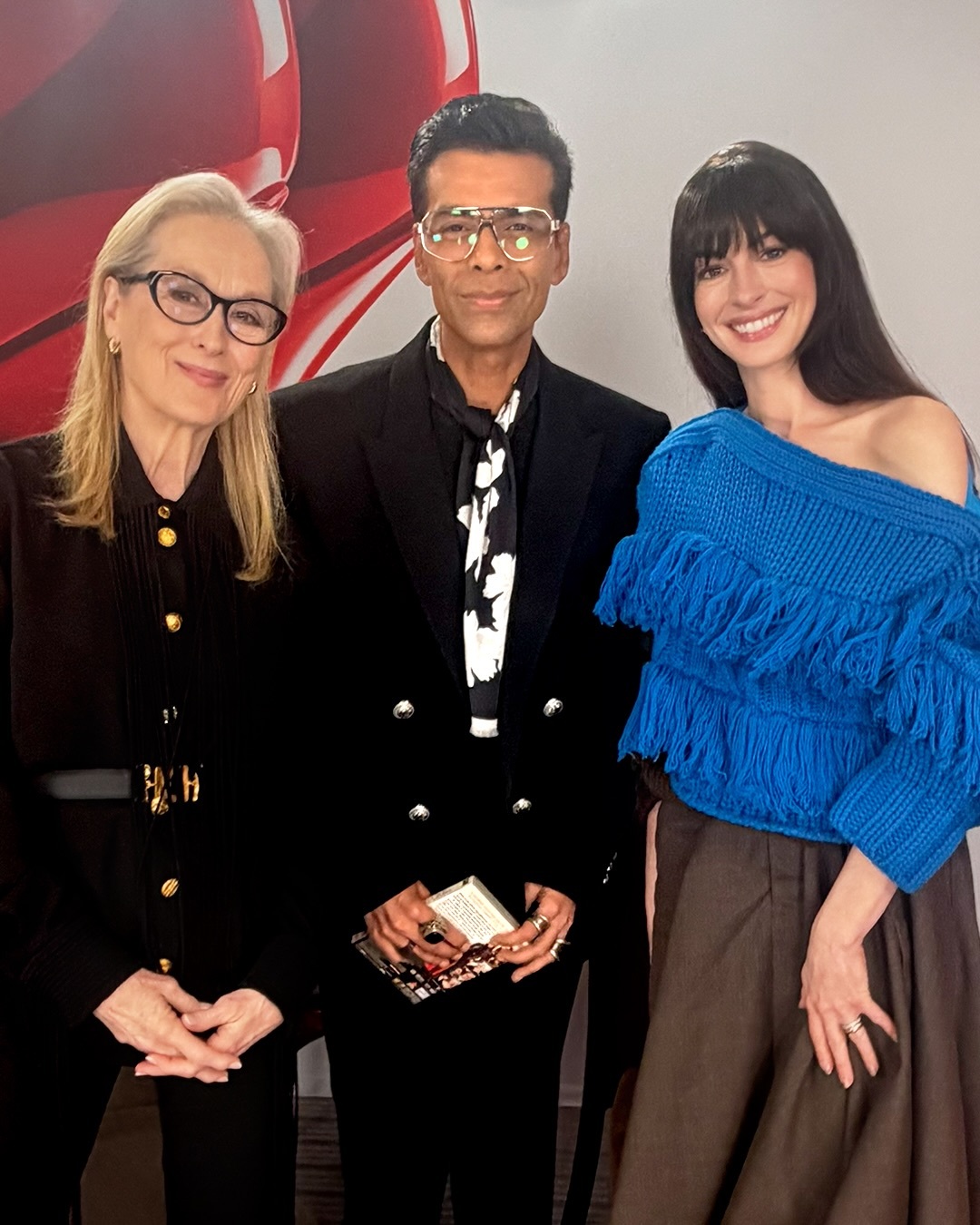 Anne's cerulean Sacai fringed sweater (the on-the-nose DWP1 callback)